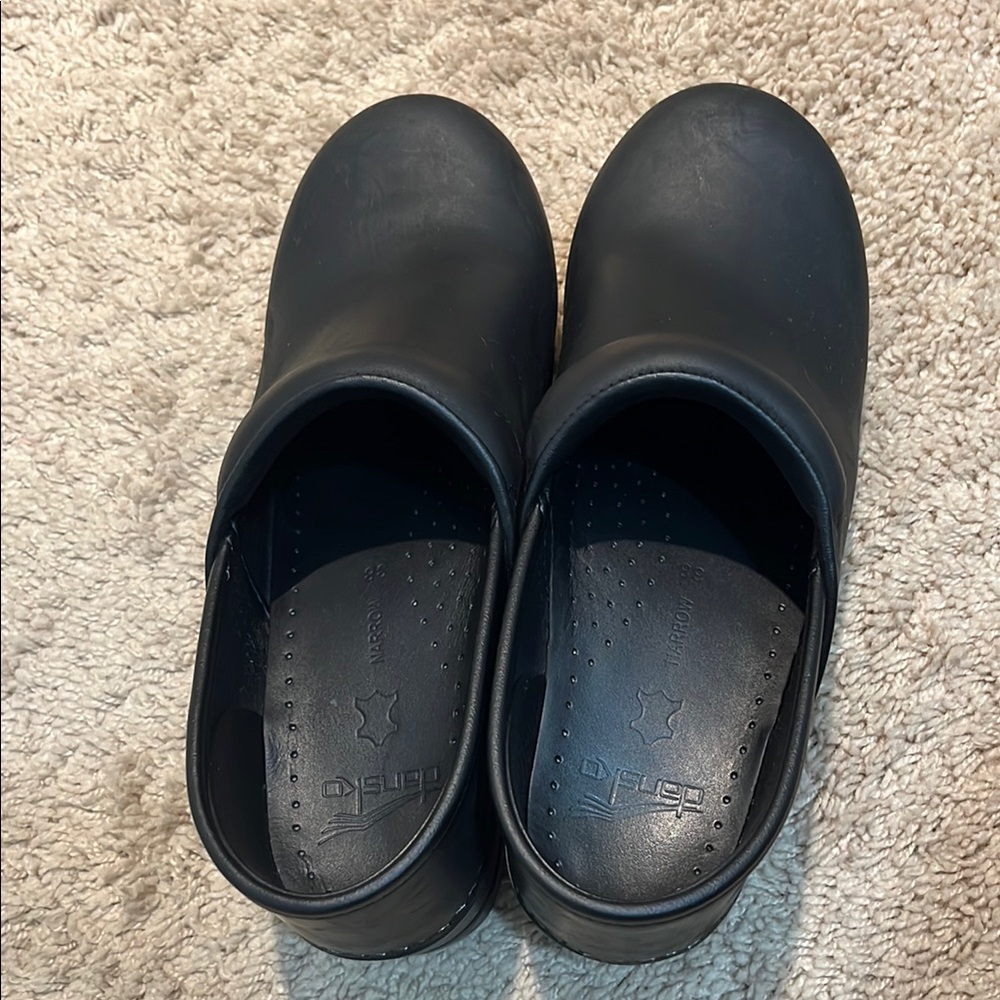 Dansko Black Clogs with Comfort Fit and Durable Sole